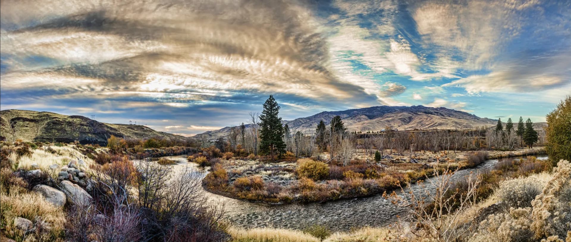 The Truckee River bending through autumn hills
